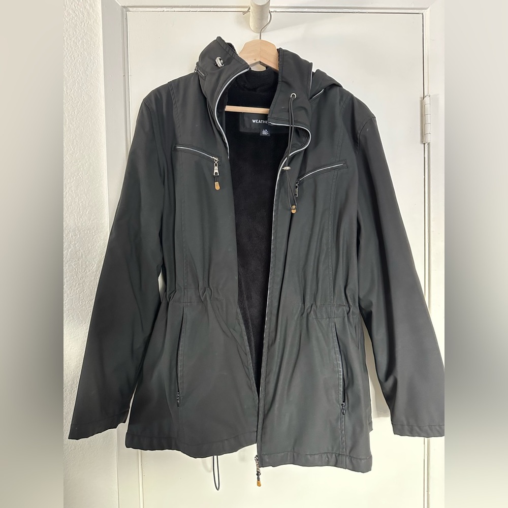 Weatherproof black rain coat
